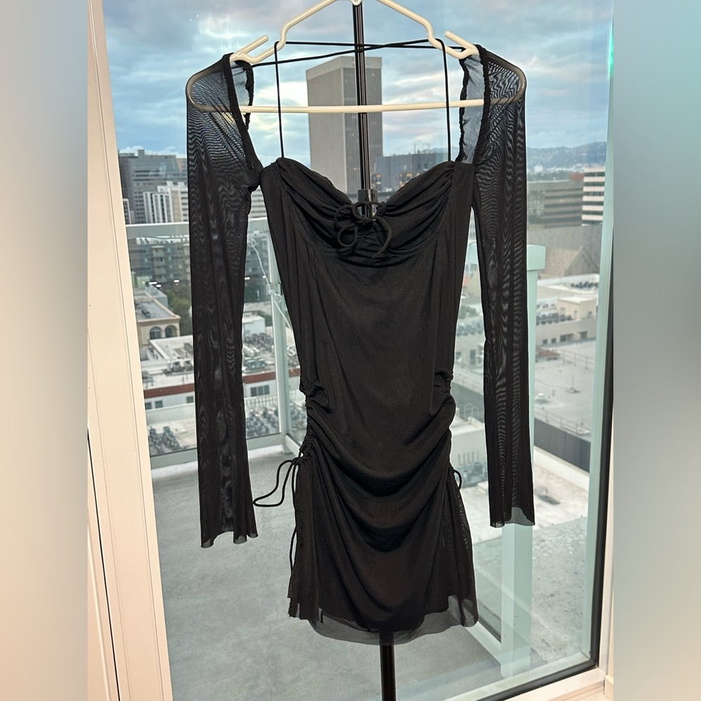 NWOT long sleeve black dress with side slits